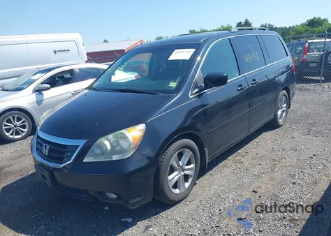 2008 Honda Odyssey Touring z USA, uszkodzony, nr VIN 5FNRL389X8B057385